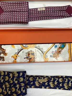 Lot 2083 - Four Hermès silk ties, cows and trees 7527 1A, geometric 5080 PA, navy horse bit 7297 EA and pink and blue Pegasus 5117 HA, all in Hermes tie boxes with tissue paper, two also in Hermes Christmas...