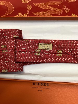 Lot 2088 - Four Hermès silk ties, rice paddy fields 7535 IA, Owl and Moon 7997 EA, ships wheel 7317 EA and stylised flowers 5010 EA, all in Hermes tie boxes with tissue paper, two also in Hermes Christmas...