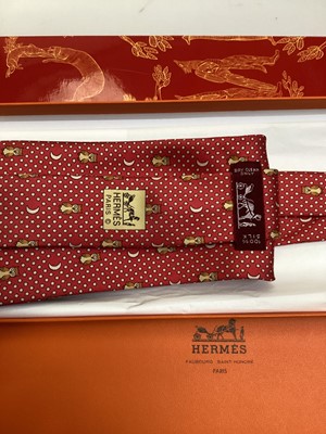 Lot 2088 - Four Hermès silk ties, rice paddy fields 7535 IA, Owl and Moon 7997 EA, ships wheel 7317 EA and stylised flowers 5010 EA, all in Hermes tie boxes with tissue paper, two also in Hermes Christmas...
