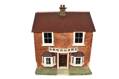 Lot 1517 - Early 20th century scratch built dolls house, dated 1921, the rear hinged for access, 60cm wide x 52cm deep x 67cm high