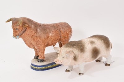Lot 326 - Tin-glaze earthenware model of a bull, probably Dutch, polychrome painted on an oval base, 20.5cm high