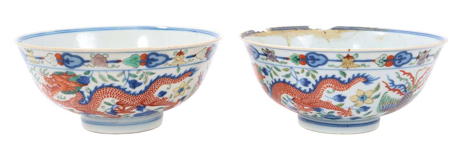 Lot 262 - A pair of Chinese porcelain bowls, Daoguang mark and period, decorated with a dragon and phoenix pattern in the Wucai style, 14.75cm diameter Provenance: brought home by Sir Francis Drum...