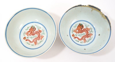 Lot 262 - A pair of Chinese porcelain bowls, Daoguang mark and period, decorated with a dragon and phoenix pattern in the Wucai style, 14.75cm diameter Provenance: brought home by Sir Francis Drum...