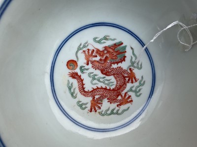 Lot 262 - A pair of Chinese porcelain bowls, Daoguang mark and period, decorated with a dragon and phoenix pattern in the Wucai style, 14.75cm diameter Provenance: brought home by Sir Francis Drum...