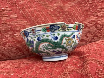 Lot 262 - A pair of Chinese porcelain bowls, Daoguang mark and period, decorated with a dragon and phoenix pattern in the Wucai style, 14.75cm diameter Provenance: brought home by Sir Francis Drum...