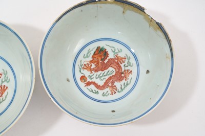 Lot 262 - A pair of Chinese porcelain bowls, Daoguang mark and period, decorated with a dragon and phoenix pattern in the Wucai style, 14.75cm diameter Provenance: brought home by Sir Francis Drum...