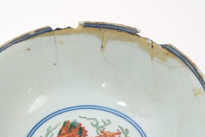 Lot 262 - A pair of Chinese porcelain bowls, Daoguang mark and period, decorated with a dragon and phoenix pattern in the Wucai style, 14.75cm diameter Provenance: brought home by Sir Francis Drum...