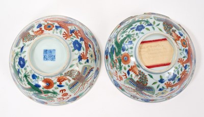 Lot 262 - A pair of Chinese porcelain bowls, Daoguang mark and period, decorated with a dragon and phoenix pattern in the Wucai style, 14.75cm diameter Provenance: brought home by Sir Francis Drum...