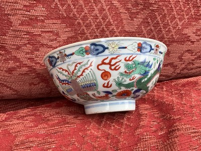 Lot 262 - A pair of Chinese porcelain bowls, Daoguang mark and period, decorated with a dragon and phoenix pattern in the Wucai style, 14.75cm diameter Provenance: brought home by Sir Francis Drum...