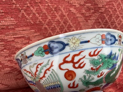 Lot 262 - A pair of Chinese porcelain bowls, Daoguang mark and period, decorated with a dragon and phoenix pattern in the Wucai style, 14.75cm diameter Provenance: brought home by Sir Francis Drum...