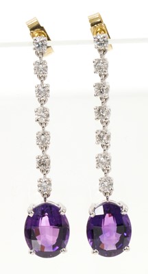 Lot 653 - Pair of amethyst and diamond pendant drop earrings