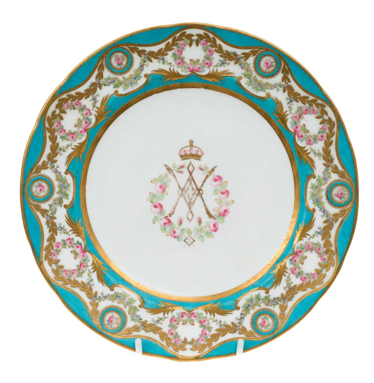 Lot 155 - H.M. Queen Victoria and H.R.H. Prince Albert The Prince Consort, fine Mintons Royal dinner plate with central crowned VA cypher within polychrome painted floral swags and wreaths on blue and gilt...