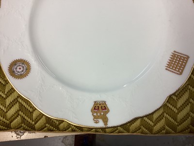 Lot 160 - H.M. Queen Victoria, Mintons Royal dinner service believed made for Windsor Castle with polychrome painted badges of state to the border and moulded swags and gilt edging, Mintons and T.Goode and...