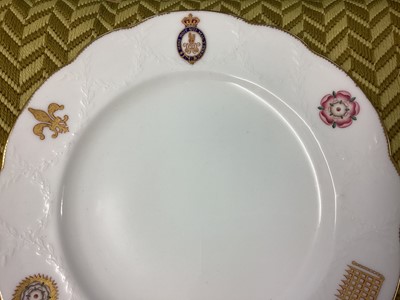 Lot 160 - H.M. Queen Victoria, Mintons Royal dinner service believed made for Windsor Castle with polychrome painted badges of state to the border and moulded swags and gilt edging, Mintons and T.Goode and...