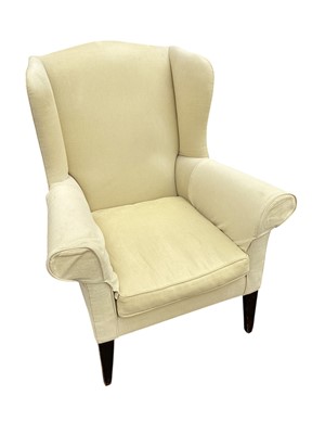 Lot 1710 - Georgian style yellow upholstered wing armchair, raised on square tapered legs