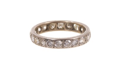 Lot 643 - Diamond eternity ring with a full band of twenty brilliant cut diamonds in 18ct white gold setting