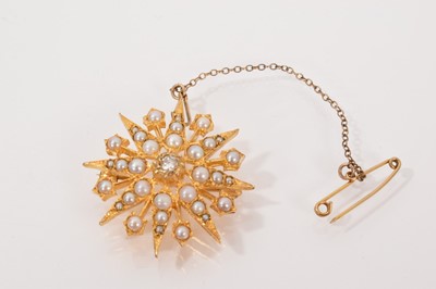 Lot 648 - Victorian-style 9ct gold diamond and seed pearl star brooch