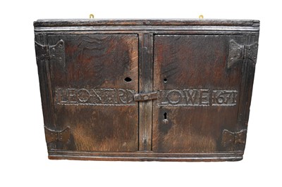 Lot 1532 - Rare Charles II oak two door mural cupboard