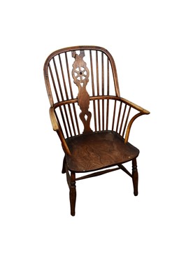 Lot 1535 - Early 19th century yew, ash and elm wheel back Windsor chair