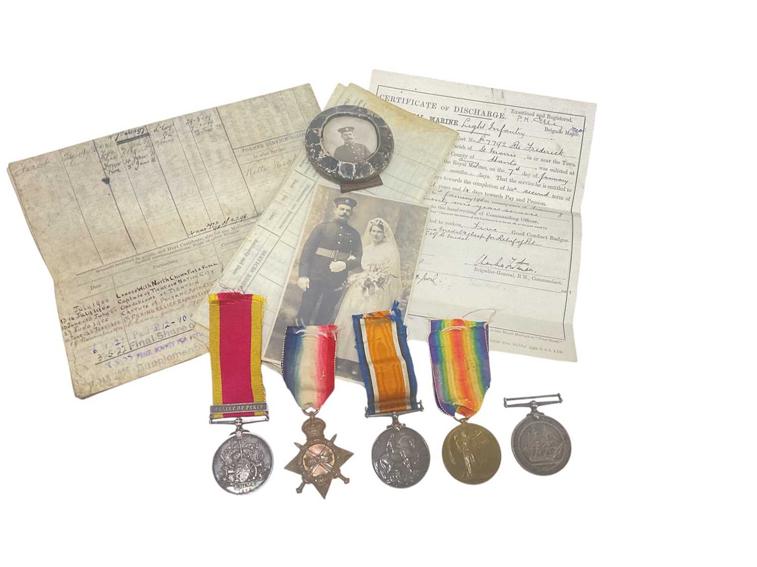 Lot 700 - Victorian and later medal group comprising China War 1900 medal with Relief of Pekin clasp named to F. Rudgeley. PTE. R. M. N. L.