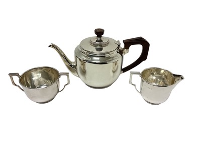 Lot 415 - Silver three piece tea set