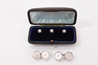 Lot 719 - Pair of Art Deco 9ct white gold cufflinks with octagonal mother of pearl and seed pearl panels, together with a set of three Continental gold dress studs