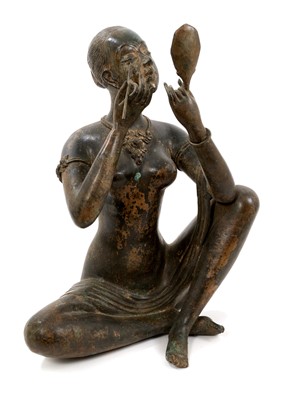 Lot 1011 - After Pierre Chenet, bronze of a lady applying make-up...