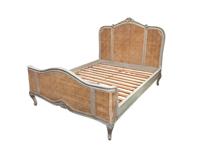Lot 1584 - Antique French rococo-style caned double bed