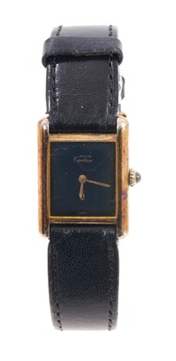 Lot 763 - Cartier Must De Cartier silver gilt tank wristwatch with mechanical movement, with papers.