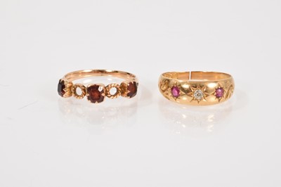 Lot 581 - Victorian ruby and diamond gypsy ring and a Victorian gold and garnet ring (2)