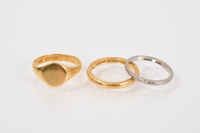 Lot 588 - 22ct gold signet ring, 22ct gold wedding ring and a platinum wedding ring (3)