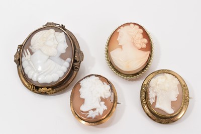Lot 592 - Four cameo brooches
