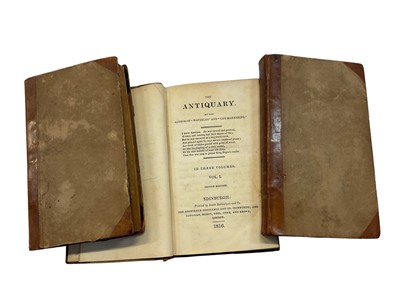 Lot 1392 - The Antiquary by Sir Walter Scott. Second edition published in 1816 in 3 volumes, in contemporary quarter calf bindings