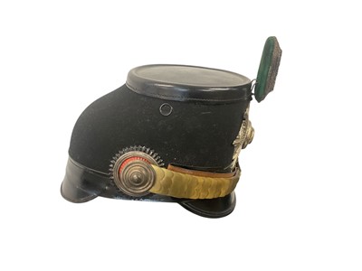 Lot 823 - Imperial German Garde Jäger Battalion Officers Shako with black felt and leather body, silvered and enamelled Garde star badge, gilt brass chin scales, silver bullion and green velvet cockade, o...