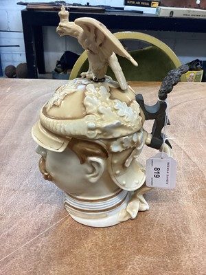 Lot 819 - Impressive Imperial German porcelain stein in the form of Kaiser Wilhelm II wearing a Garde du Corps helmet, the hinged cover with metal mount and ornate thumb piece with cross and laurel wreath...