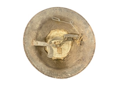 Lot 834 - First World War Mark 1 British Officers steel helmet with traces of square badges front and back, traces of liner and camouflage netting with leather chin strap, stamped numbers to rim
