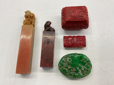 Lot 366 - Two Chinese carved hard stone seals, two other carved plaques and a small cinnabar box with cover (5)