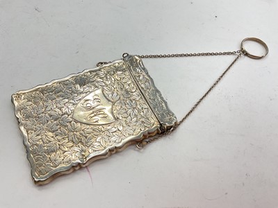 Lot 9 - Late Victorian silver card case, with engraved floral decoration and initials, hinged opening cover and suspension chain