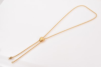 Lot 667 - Victorian gold rope twist necklace with floral engraved heart-shaped slide