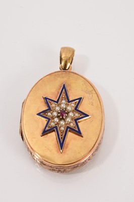 Lot 668 - Victorian gold locket with starburst ruby, seed pearl and blue enamel star, with finely engraved foliage gold back