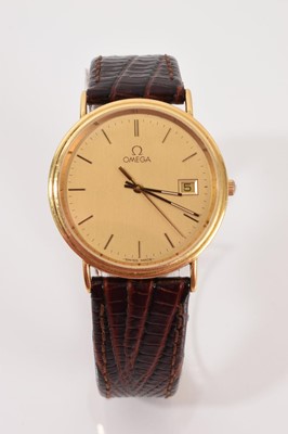 Lot 765 - Omega 18ct gold quartz wristwatch on brown leather strap