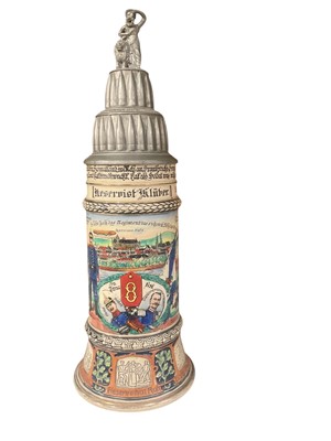 Lot 849 - Imperial German military pottery stein with hinged pewter lid with stacked shells, Godess and lion mounts, transfer and painted military decoration named to ' Reservist Kluber, 8 Inf.Rgt. Srokke...