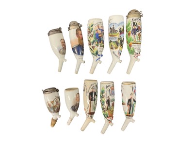 Lot 854 - Eight Imperial German military porcelain Stummel pipe bowls with painted and transfer Regimental decoration (8)