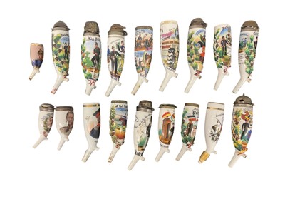 Lot 857 - Seventeen Imperial German military porcelain Stummel pipe bowls with painted and transfer Regimental decoration and some with pickelhaube and Kepi covers (17)