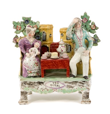 Lot 150 - Early 19th century Staffordshire pearlware Obadiah Sherratt type figure group ‘Tee Total’