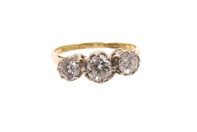 Lot 653 - Diamond three stone ring in 18ct gold setting (London 19750