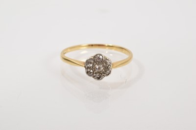 Lot 609 - Edwardian diamond daisy cluster ring in platinum setting on 18ct gold shank