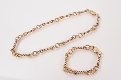Lot 631 - 9ct gold rope twist bar and link chain necklace and matching bracelet