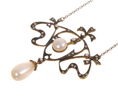 Lot 637 - Edwardian style cultured pearl and diamond set open work pendant necklace