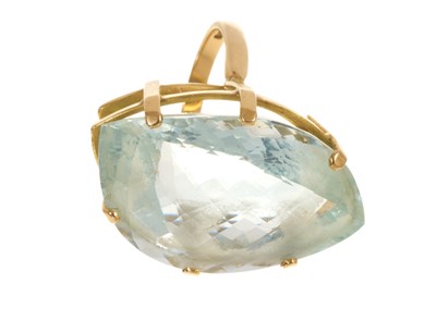 Lot 640 - Large aquamarine dress ring with a fancy cut aquamarine in 18ct gold setting